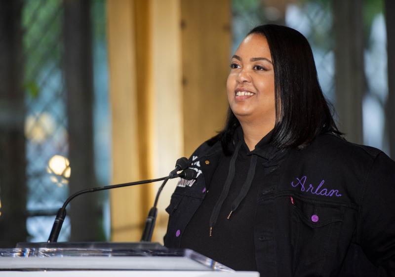 Picture of Arlan Hamilton speaking at the event